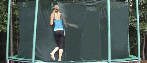 trampoline with safety enclosure