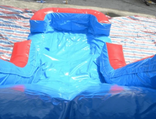 large inflatable slide part of commercial bounce house